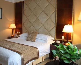 New Century Hotel Taizhou - Taizhou - Bedroom