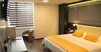 Hotel Italia - Cuenca - Schlafzimmer