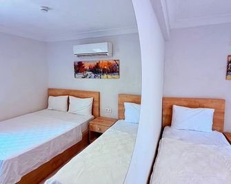 Ados Hotel - Cesme - Bedroom
