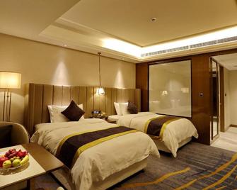 Yibin Celebrity City Hotel - Їбін - Спальня