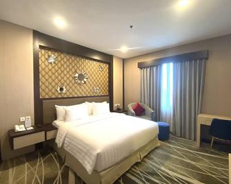 Best Western Batang Garing - Palangkaraya - Bedroom