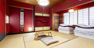 Kanazawa Guesthouse Nagonde - Hostel - קאנאזוואה - חדר שינה