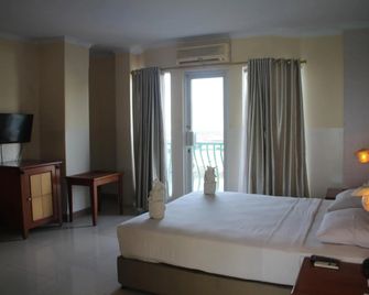 Hotel Celebes - מאנאדו - חדר שינה