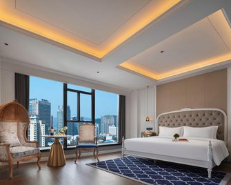 Exotic Impression Hotel (Changsha Wuyi Square Helong Sports Center) - Changsha - Soveværelse