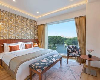 ExpoInn Suites and Convention - Greater Noida - Slaapkamer