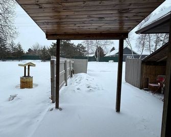 Nisswa Hotel & Suites – Round Lake King Patio Suite with Full Kitchen - Nisswa