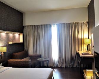 Hotel Satkar Residency - Thāne - Bedroom