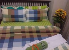 1br Luxury Condo - Badiangan - Schlafzimmer