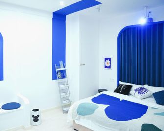 Time Travel Homestay (Wanda Plaza Branch) - Daqing - Schlafzimmer