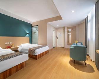 Xinxiang 988 Hotel (No. 2 Middle School and Second Hospital Branch) - Xinxiang - Bedroom