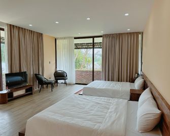 Con Nho Riverhouse Hue - Huế - Schlafzimmer