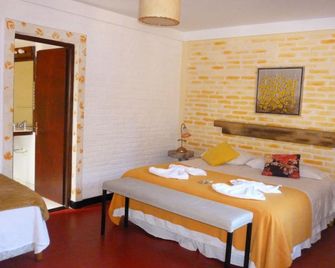 Passaros Suite Hotel - פוארטו איגואזו