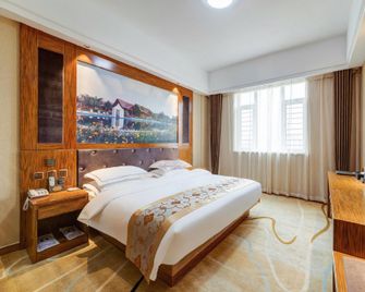 Zhongwei Jinsha Meicheng Hotel - Zhongwei - Schlafzimmer