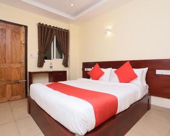 OYO 23318 West Gate Inn & Suites - Idukki - Habitación