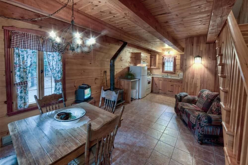 Les Chalets sur le Cap - بيوبري - غرفة طعام