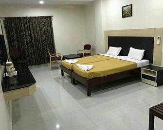 Hotel Diamond Kumbakonam - Kumbakonam - Slaapkamer