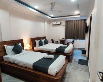 Lisa Guest House - Guwahati - Habitación