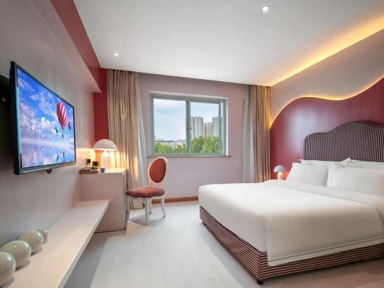 Nanyang Art Exquisite Hotel (Nanyang Fuyu Wuhouyu Branch) - نانيانغ - غرفة نوم