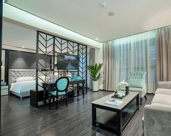 Xana Hotelle Kaifeng Qingming Shanghe Garden - Kaifeng - Living room