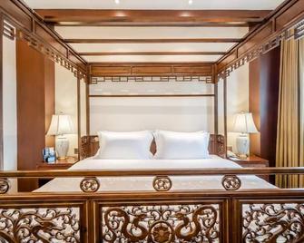 Buddha Zen Hotel - צ'נגדו - חדר שינה