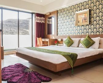 Shri Vitthal Mangalam - Hotel In Satara - Sātāra - Bedroom