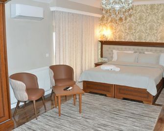 Hotel Begolli - פריסטינה - חדר שינה