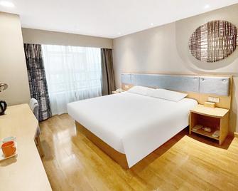 Home Inn Neo Mianyang People's Park - Mianyang - Habitación