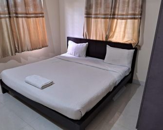 Symphony Suites Service Apartment - Bengaluru - Bedroom