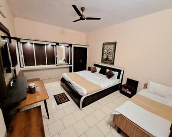 Abha hotel - Faizābād - Habitación