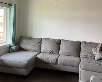 Swim, fish, and explore bluffs, just across the street. - Lowell - Living room