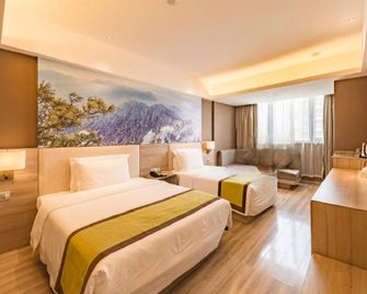 Rezen Hotel Luoyang Wangfujing Wuduo - Luoyang - Bedroom