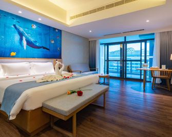 Asia Bay International Hotel - Qionghai - Slaapkamer