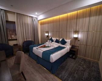 Al Ebaa Hotel - Mecca - Bedroom