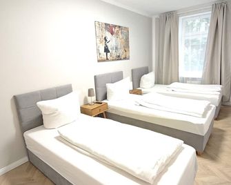 Zollikof Aparts - Sauna & Studioapartments - Leipzig / Halle - Slaapkamer
