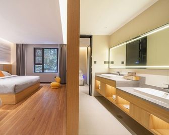 Manting Meisu Hotel - Kuang-jüan - Ložnice
