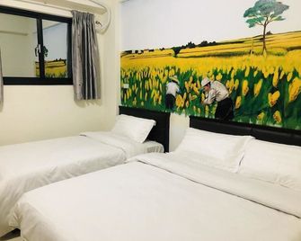 Jin Da Paint B&B - Jinning Township - Bedroom