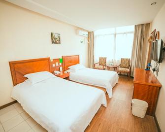 Greentree Inn Yangzhou Slender West Lake Wencheng Attic Express Hotel - Yangzhou - Κρεβατοκάμαρα