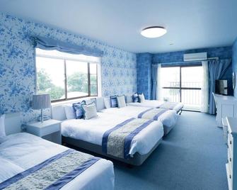 Hotel Caretta Amami - Tatsugo - Bedroom
