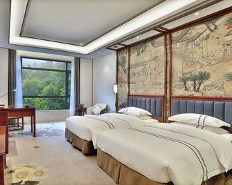 Shaoxing Shangyu Hotel - שאושינג - חדר שינה
