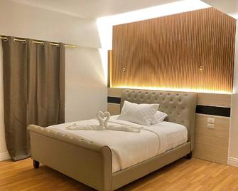 H Mansion Hotel - Tandag - Habitación