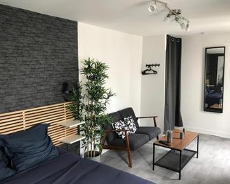 Les Appartements de St-Etienne - Фекам - Вітальня