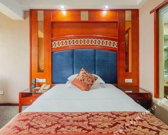 Jinye Grand Hotel Leshan - Leshan - Slaapkamer