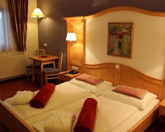 Hotel Berghof - Sonnenalpe Nassfeld - Bedroom