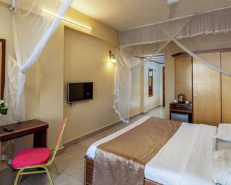 Pulickal Airport Hotel. - Entebbe - Habitación