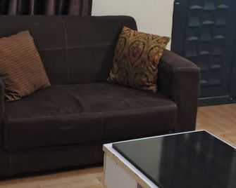 Edo Global Hotel & Suites - Benin City - Living room