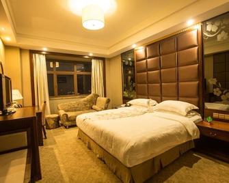 Hailian International Hotel - Ji'an - Slaapkamer