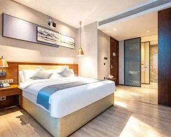 International Exhibition and Convention Tocasi Hotel (Swatow Suning Plaza Mixc City Store) - Shantou - Slaapkamer