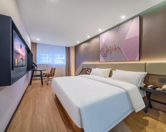 7 Days Premium (Chongqing Yangjiaping Pedestrian Street Center) - Chongqing - Habitación