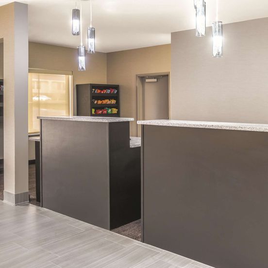 Front desk view of La Quinta Inn & Suites by Wyndham Rome