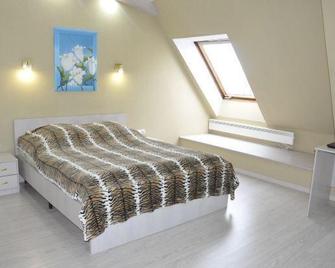 Glarus Hotel - Murmansk - Schlafzimmer